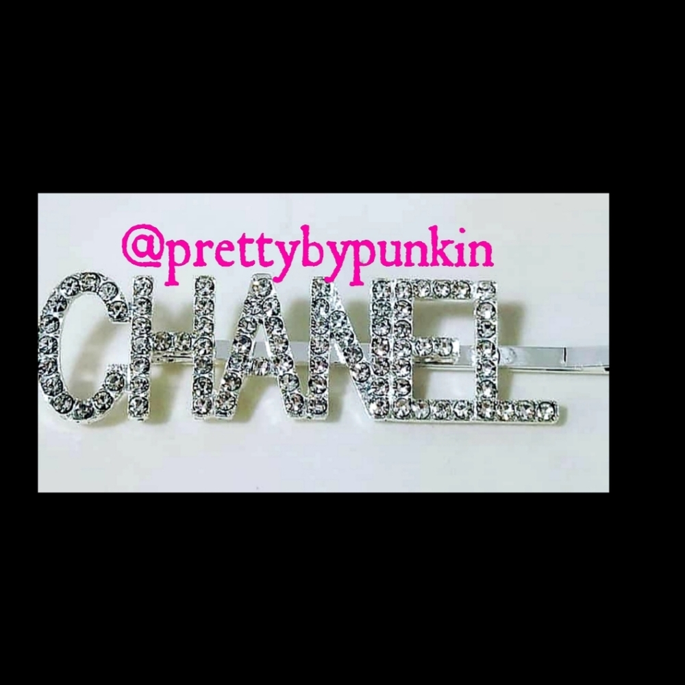 Silver hair pin.